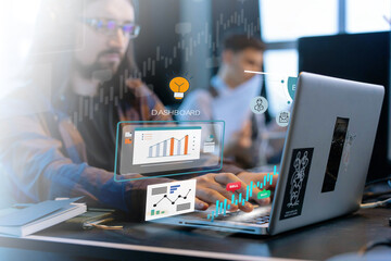 Man working with data analysis on laptop