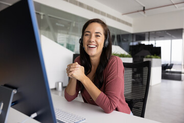 Professionalism and happiness. Portrait happy motivated woman call center consultant telemarketer...