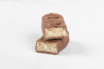 Chocolate Candy bar with coconut pulp. White background