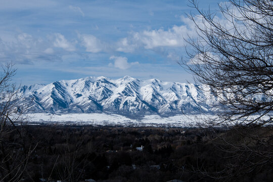 Mountains covered in snow under a blue sky
