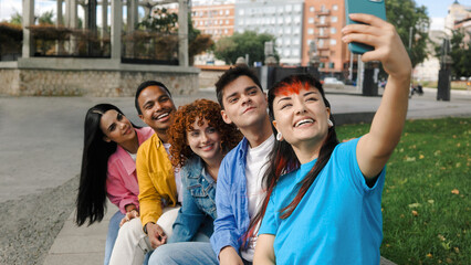 Happy group of friends take selfie picture looking at camera, Young people celebrate together