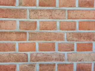 This is the texture of a Classic Red Brick Wall showcasing intricate details and grout
