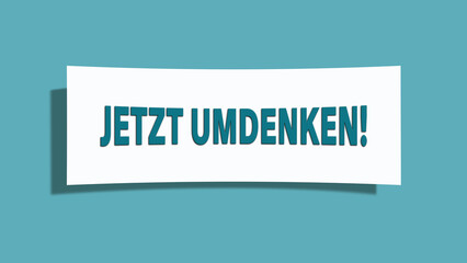 Jetzt umdenken (Now think again) - A card isolated on light green background.