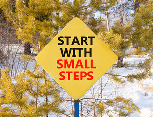 Start with small steps symbol. Concept words phrase Start with small steps on beautiful yellow road...