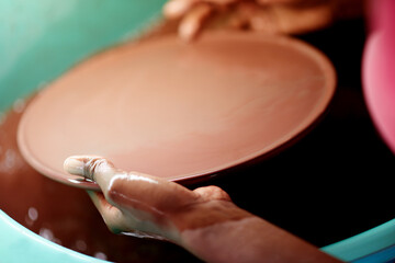 Workshop, artisan and hands with art, ceramic and manufacturing of sculpture, creative and small...