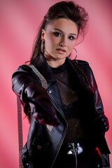 An Edgy Fashion Portrait Captured Against a Vibrant Pink Background, Full of Life and Style