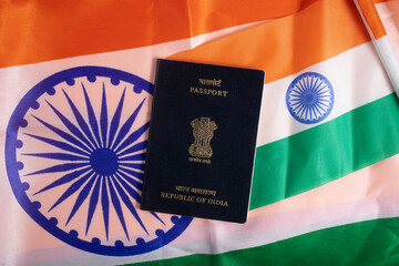 Indian passport on the national flag symbolizes identity and travel.