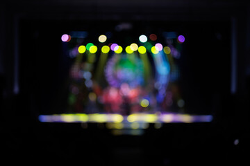 Texture blur and defocus, background for design. Stage light at a concert show in theater.