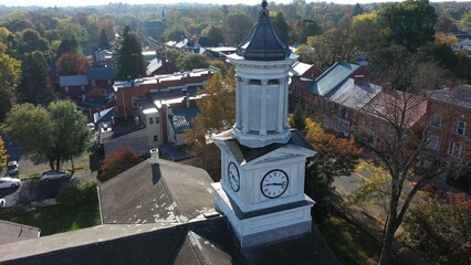 Closeup aerial camera orbiting around McMurrin Hall in Shepherdstown, WV on an autumn morning.