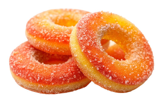 Stack of delicious peach flavored gummy rings with sugar crystals on White background