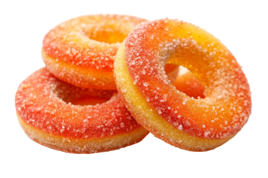 Stack of delicious peach flavored gummy rings with sugar crystals on White background