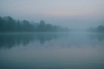 Fototapeta premium Misty Lake Dawn Serene Atmospheric Background