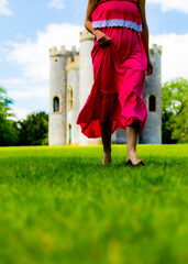Fototapeta premium A young woman is playing in the park.