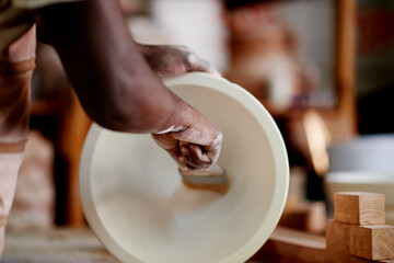 Workshop, pottery and painting of art, creative and hands with brush for color, retail or startup. Decoration, artist and person with skills for design, small business or talent for sculpture in shop