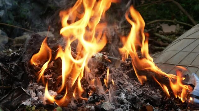 burning trash during the day