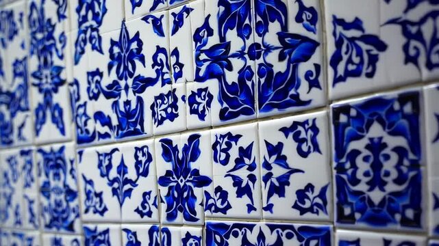 Dynamic perspective shift on blue and white ornate ceramic tiled wall