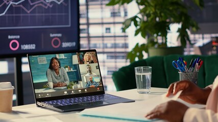 African american CEO meeting with the forecast affiliates on online videocall, discussing about the...