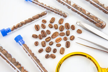 Laboratory coffee analysis with test tubes, magnifying glass, and tweezers, representing quality testing and food science