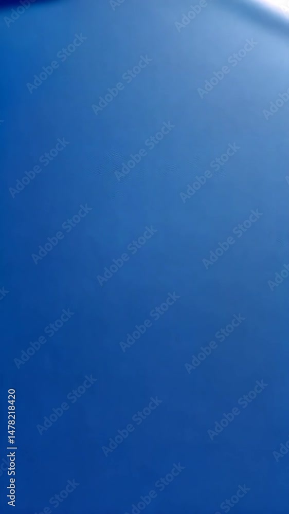 Poster abstract closeup of fine blue fabric with diagonal ribbing texture and subtle gradations of tone in 