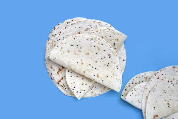 Quinoa tortilla wraps on white background