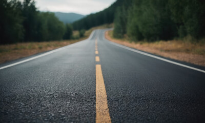 A road with a yellow line marking the edge