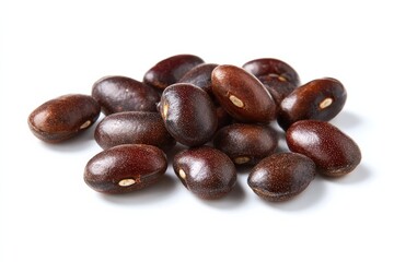 A pile of dark brown beans on a white background.