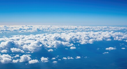 Aerial view of clouds representing freedom and serenity, with blue sky