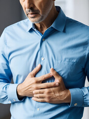 Man experiencing severe chest pain possibly indicative of a serious cardiac event