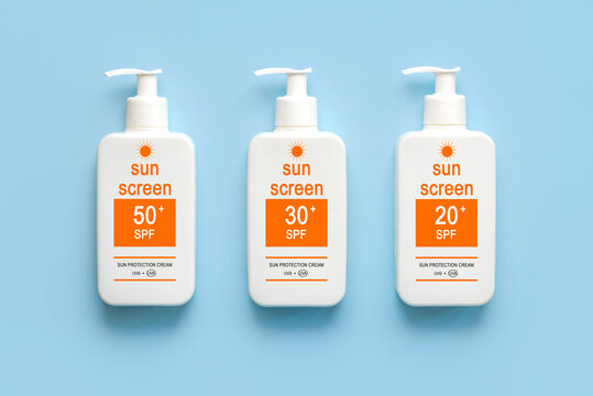 Top view of bottles of sunscreen with different spf numbers. Concept of sun protection