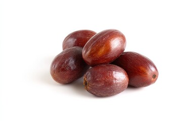 Obraz premium A pile of fresh, red jujubes on a white background.