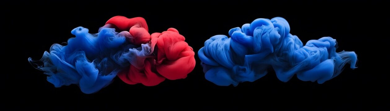 Abstract colorful ink cloud formations on black background.