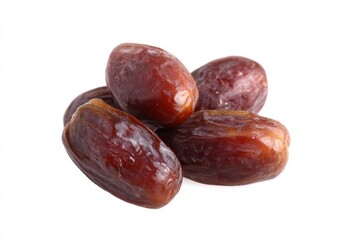 Obraz premium Close-up of several dates, showing their rich, dark brown color and wrinkled texture.