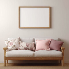 Modern living room interior with beige sofa, pink cushions, wooden frame, and empty picture frame on neutral wall
