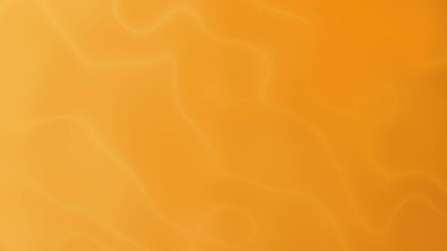 Solid orange background with subtle waves. Suitable for graphic design projects, website banners, or vibrant social media posts.