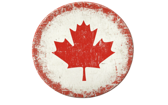 Ice hockey puck displaying the Canada flag print with noticeable scuff marks after play isolated on white background PNG