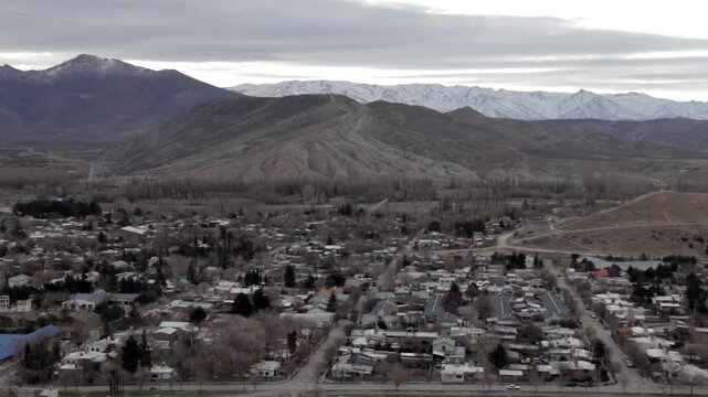 Snowy Andes Behind the Rural Cityscape of Chos Malal, Patagonia, Neuquen, Argentina