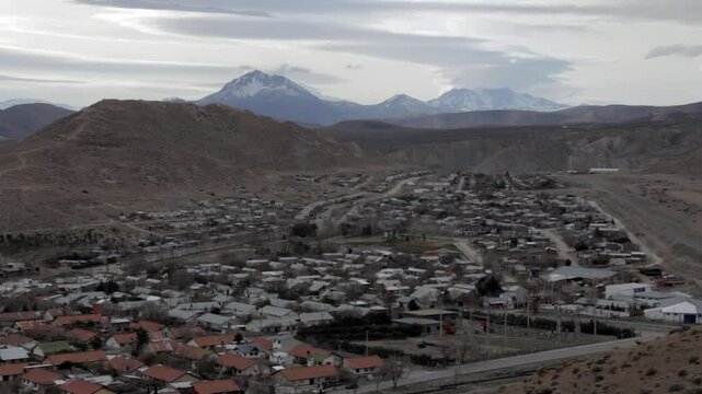 View of the Patagonian City of Chos Malal, With Snowy Andes Mountains in the Background, Neuquen, Argentina