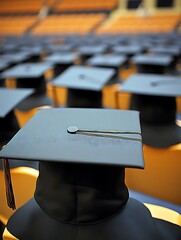 Graduation caps in auditorium