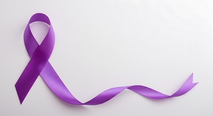 Stock photo of purple ribbon awareness symbol for lupus alzheimer pancreatic cancer and domestic violence