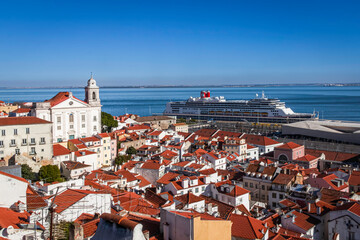 Lisbon, Portugal - Cruise ship seen from Portas do Sol viewing point in Alfama area of Lisbon