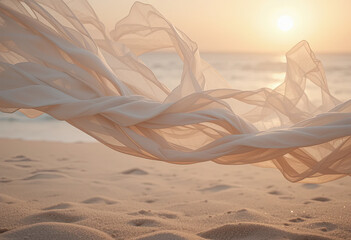 Elegant white fabric flowing above sandy beach at golden sunset with soft ocean waves in background, capturing freedom, femininity, and peaceful natural beauty