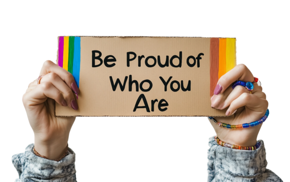 Person proudly holding a handmade "Be Proud of Who You Are" sign symbolizing self-empowerment isolated on white background PNG