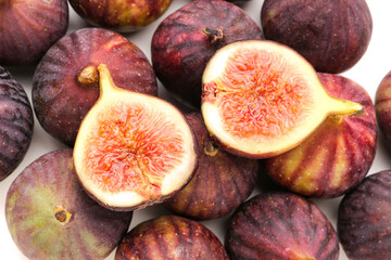 Fresh ripe figs on white background