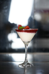 bowl with sweet dessert condensed milk with strawberry syrup tasty high-calorie food taste
