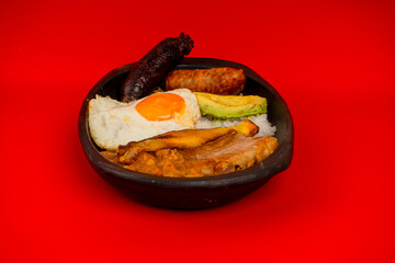 Tray paisa the most representative dish of Colombia