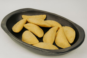 Colombian empanada with spicy sauce 