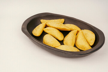 Delicious traditional Colombian empanadas with spicy sauce