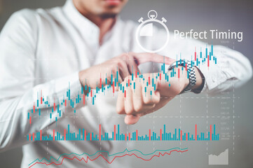 Businessman in white suit looking at watch. It's the right time to do business. The graph is going up..