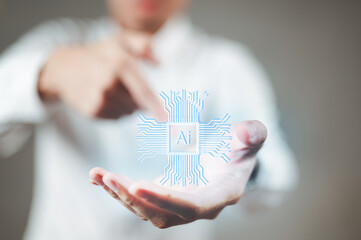 businessman in a white suit is holding a Ai in his hand and pointing. Artificial Intelligence. Using command prompt for generates something. Futuristic technology transformation.