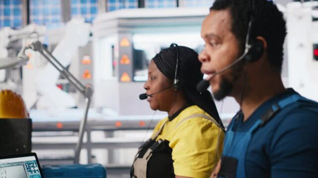 Engineer provides technical support via headset in solar panel factory, operator assists customers with solar equipment issues. Ensuring efficient communication on the helpline. Camera A.